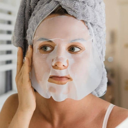 woman wearing a hydrating sheet mask smooth and firm skin use weekly